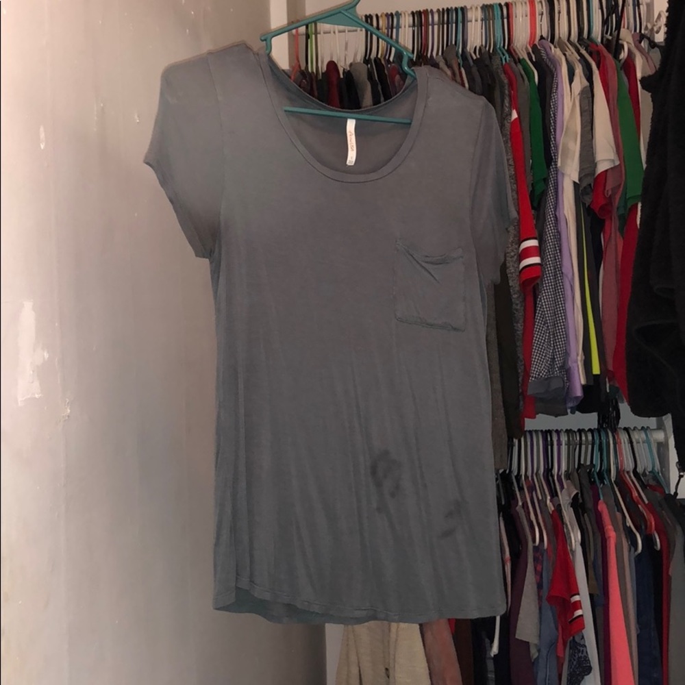 Gray short sleeve shirt.